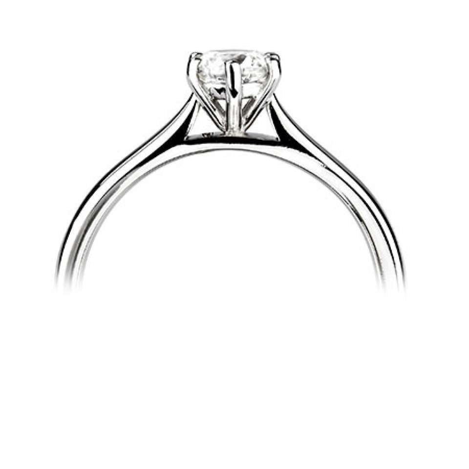 A CLASSIC SIX CLAW 1 CARAT ROUND SOLITAIRE WITH PLAIN SHOULDERS.