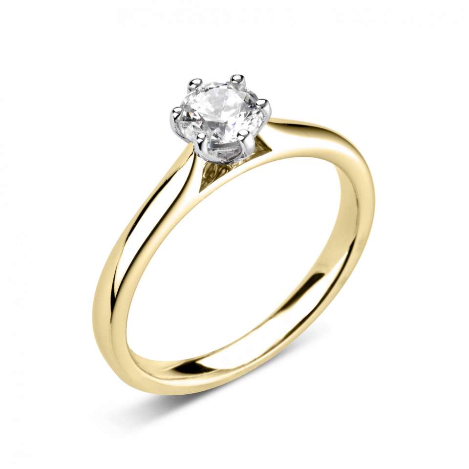 A CLASSIC SIX CLAW 1 CARAT ROUND SOLITAIRE WITH PLAIN SHOULDERS.