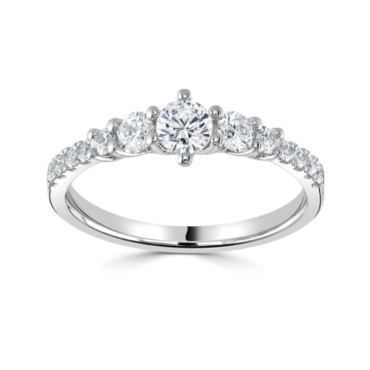 AN ELEGANT GRADUATED ROUND FIVE STONE RING WITH DIAMOND SET SHOULDERS.