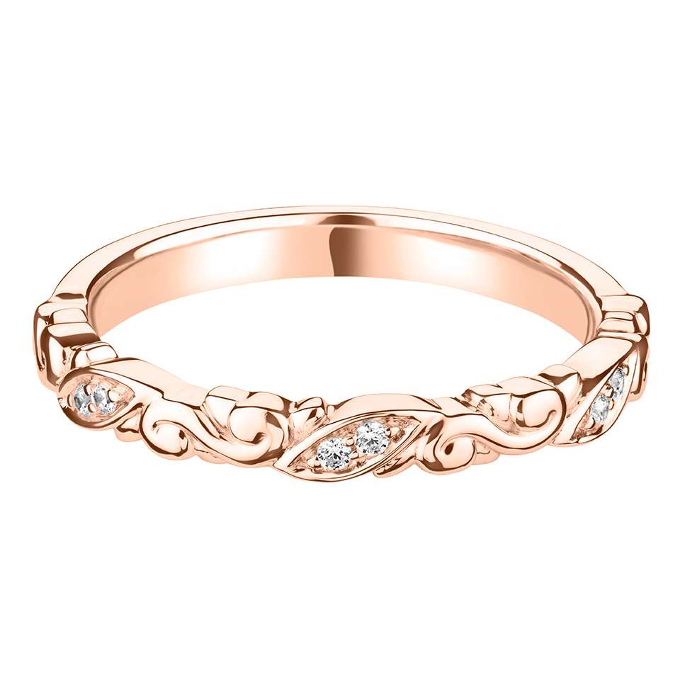 A DIAMOND SET CARVED DECORATIVE BAND WITH MARQUISE STYLE SETTINGS