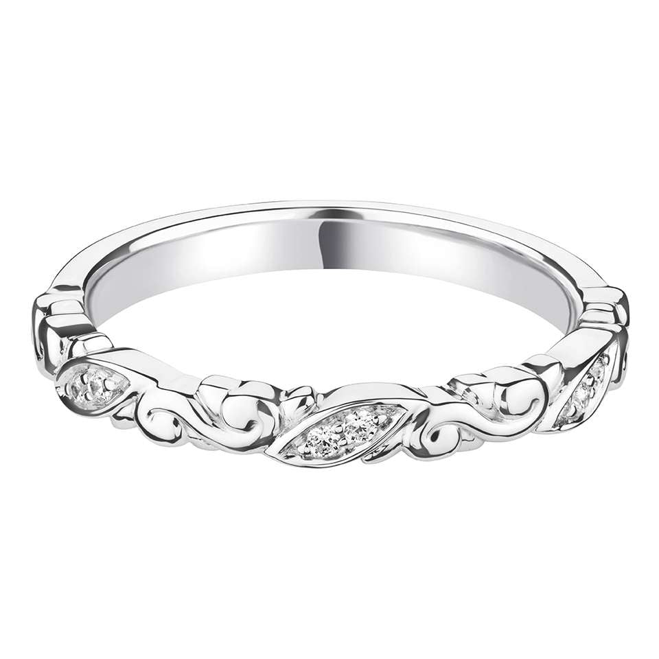 A DIAMOND SET CARVED DECORATIVE BAND WITH MARQUISE STYLE SETTINGS