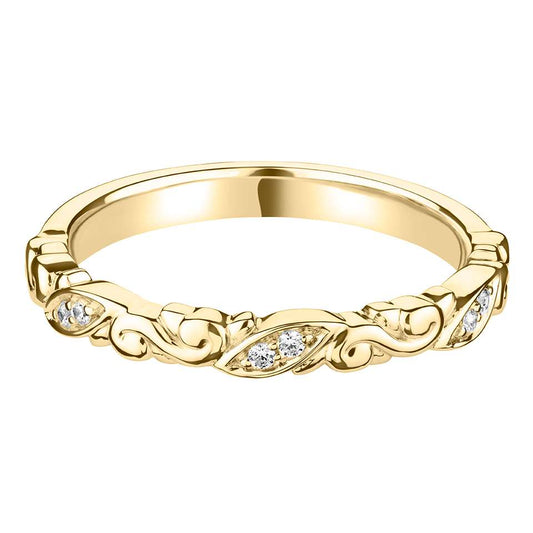 A DIAMOND SET CARVED DECORATIVE BAND WITH MARQUISE STYLE SETTINGS